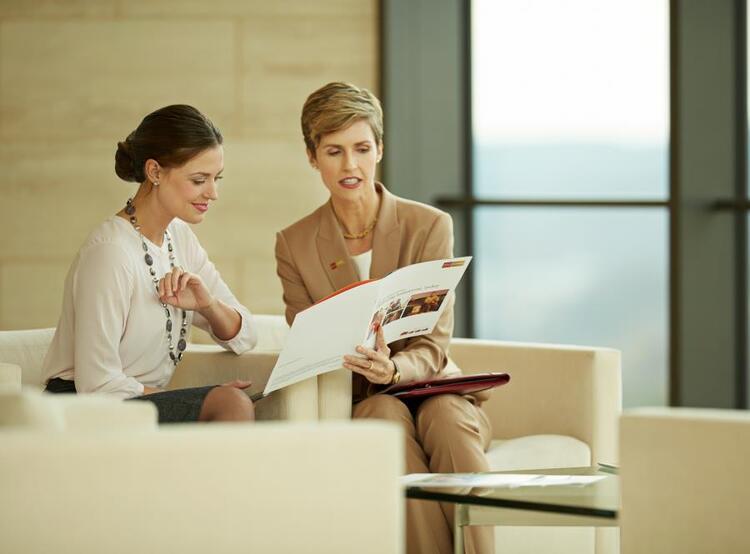 female financial advisor consulting with client